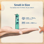 Olight Teal I3E flashlight in hand, showcasing its compact size and palm tree design for everyday carry.