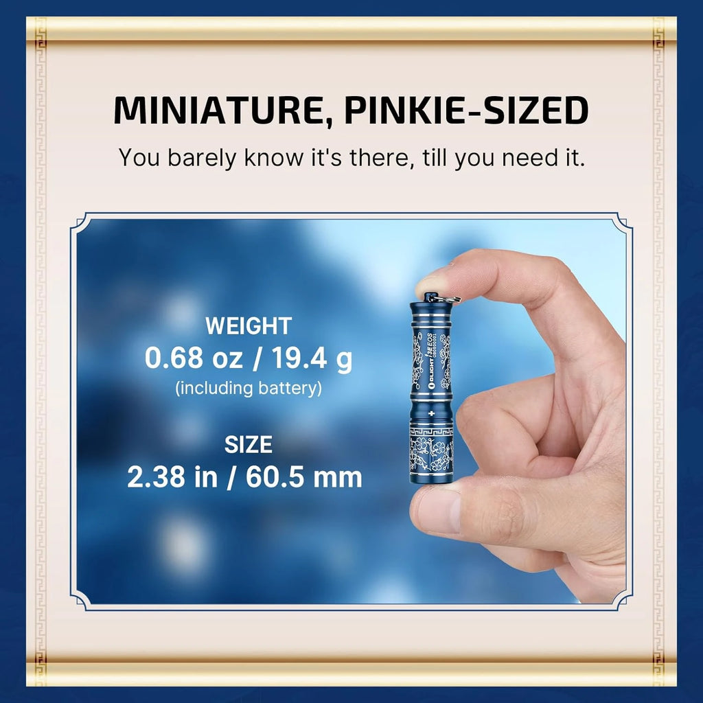 Olight Blue I3E Flashlight held in hand, showing miniature pinkie-sized for everyday carry.